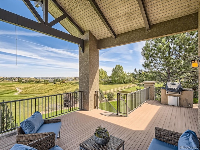 deck featuring an outdoor living space and a grill