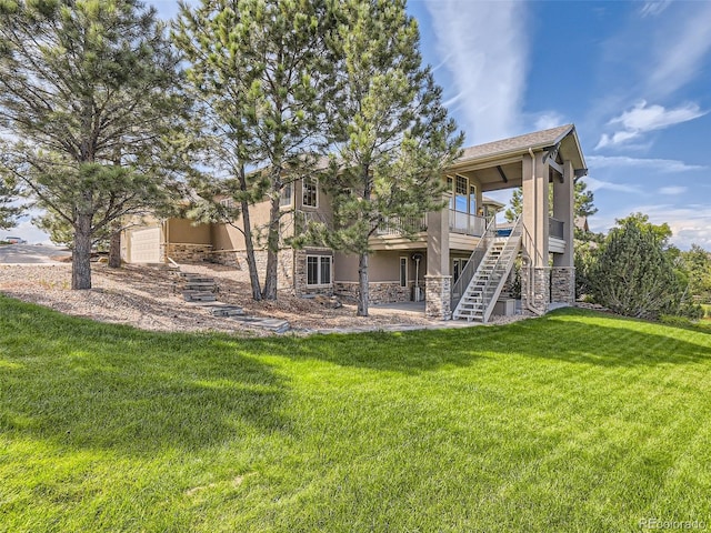 view of yard with stairway and a deck