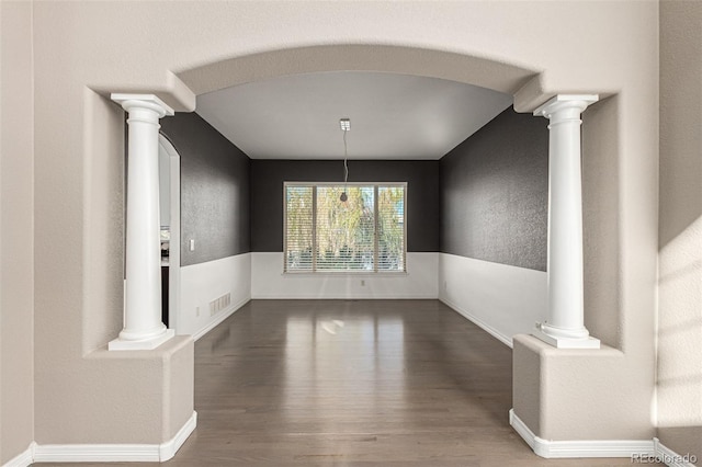 unfurnished dining area with wood-type flooring