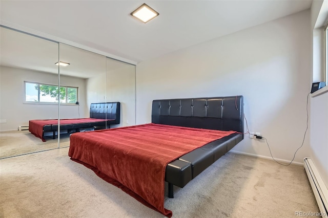 8414 S Otis St, Littleton, CO 80128 - carpeted bedroom with a baseboard radiator, a baseboard heating unit, and a closet