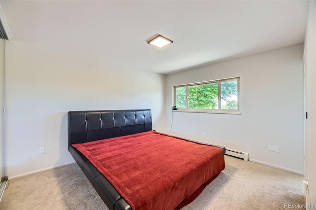 8414 S Otis St, Littleton, CO 80128 - bedroom with a baseboard radiator and carpet