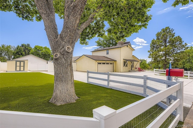 8414 S Otis St, Littleton, CO 80128 - view of front of property with concrete driveway and an outdoor structure