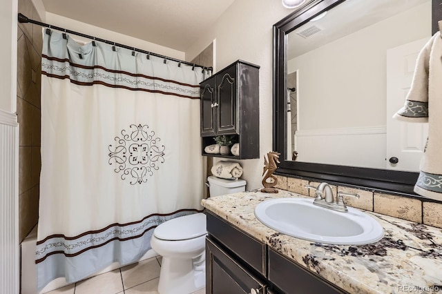 5133 E Essex Ave, Castle Rock, CO 80104 - bathroom featuring vanity, tile patterned floors, and shower / bath combination with curtain
