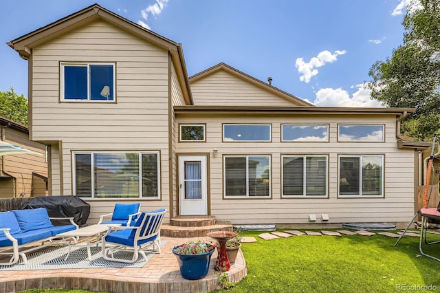 5133 E Essex Ave, Castle Rock, CO 80104 - rear view of house with a patio, a yard, and entry steps