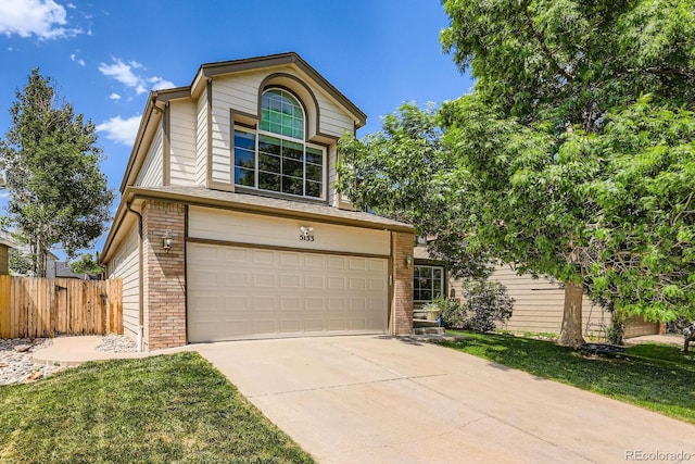 5133 E Essex Ave, Castle Rock, CO 80104 - traditional-style home featuring a garage, brick siding, and driveway