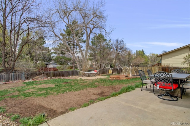3006 Oro Blanco Dr, Colorado Springs, CO 80917 - view of yard featuring outdoor dining area, a patio, and a fenced backyard