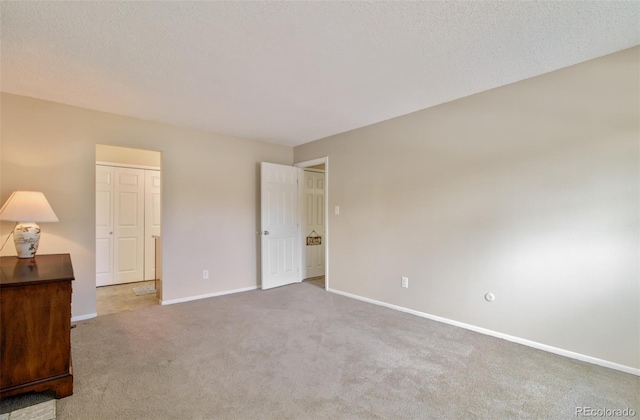3006 Oro Blanco Dr, Colorado Springs, CO 80917 - unfurnished bedroom featuring baseboards and carpet