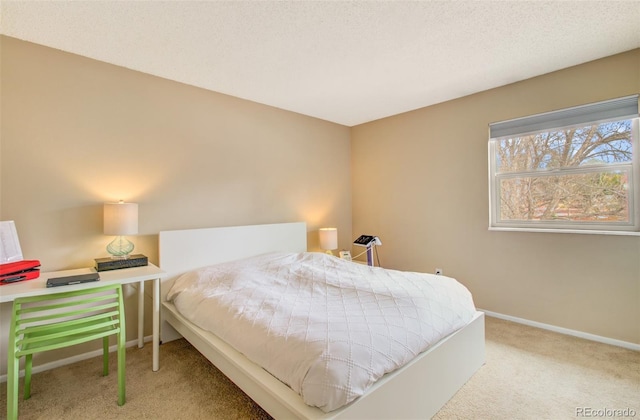 3006 Oro Blanco Dr, Colorado Springs, CO 80917 - carpeted bedroom with baseboards