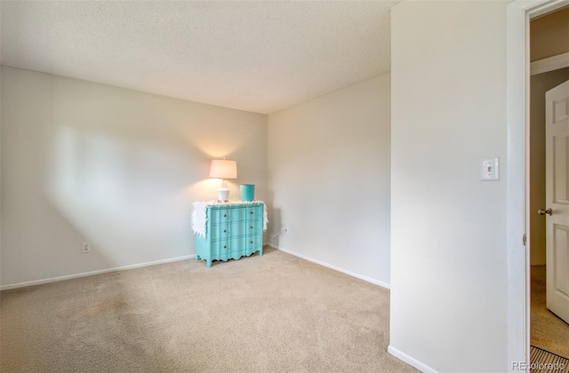 3006 Oro Blanco Dr, Colorado Springs, CO 80917 - spare room with baseboards and carpet flooring