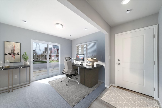 office space with baseboards