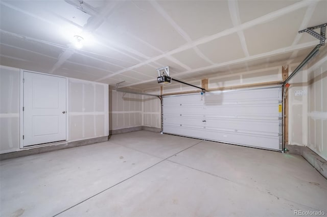 garage featuring a garage door opener