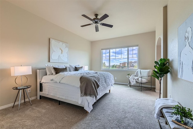 bedroom featuring baseboards, carpet, and a ceiling fan