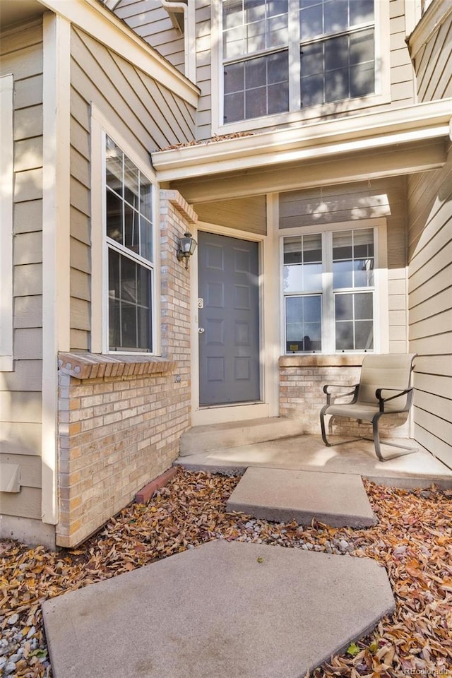 entrance to property with covered porch