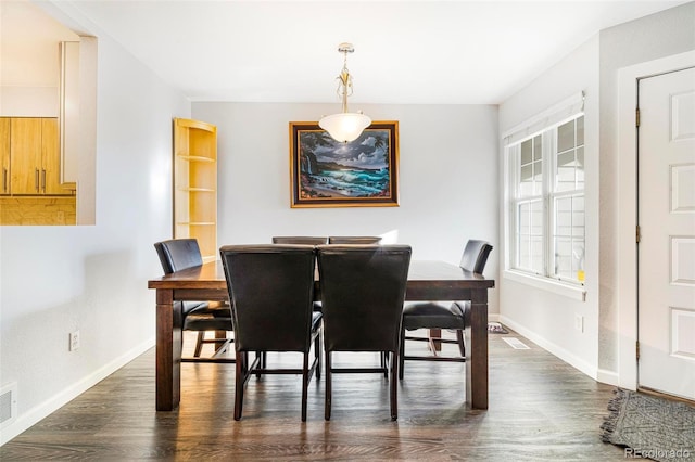 7373 E Iowa Ave Unit 1101, Denver, CO 80231 - dining space featuring dark wood finished floors and baseboards