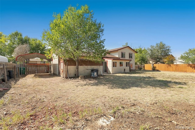 view of yard with a carport