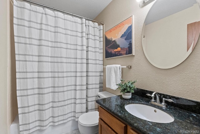 full bathroom with shower / tub combo with curtain, vanity, and toilet