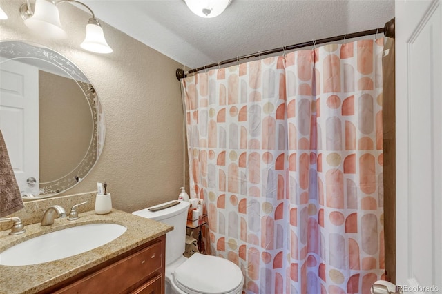 bathroom featuring toilet, curtained shower, a textured ceiling, vanity, and a textured wall