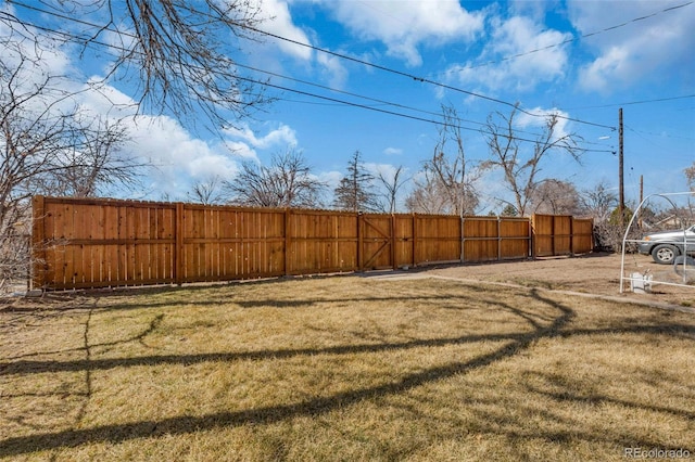 view of yard featuring fence