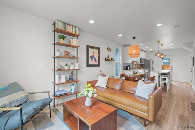 3317 W 37th Ave, Denver, CO 80211 - living room featuring recessed lighting, light wood-type flooring, visible vents, and baseboards
