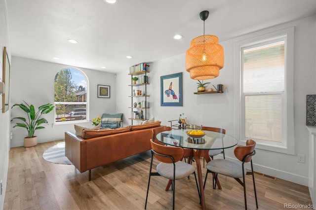 3317 W 37th Ave, Denver, CO 80211 - living area featuring baseboards, wood finished floors, visible vents, and recessed lighting