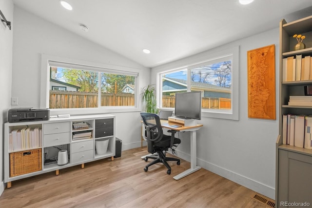 3317 W 37th Ave, Denver, CO 80211 - home office with recessed lighting, light wood-style floors, vaulted ceiling, and a healthy amount of sunlight