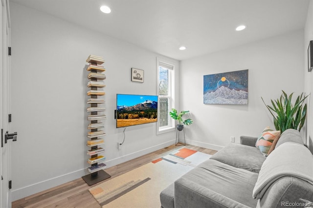 3317 W 37th Ave, Denver, CO 80211 - living area featuring baseboards, wood finished floors, and recessed lighting