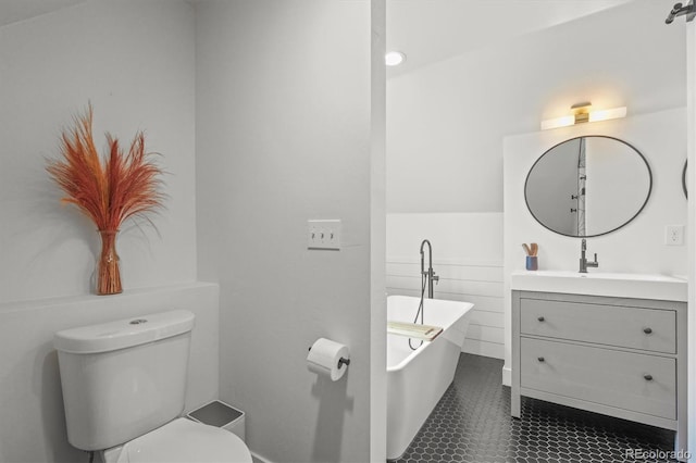 3317 W 37th Ave, Denver, CO 80211 - full bath featuring a freestanding tub, vanity, and toilet