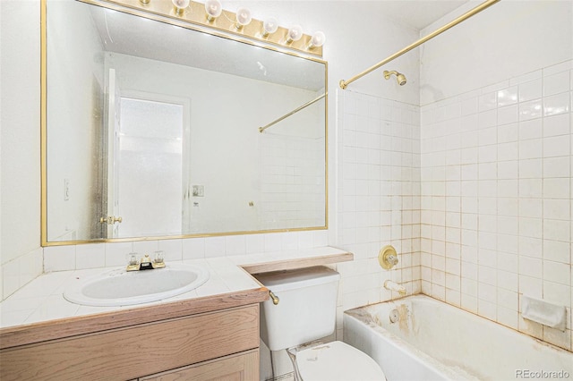 full bath with shower / bath combination, toilet, and vanity