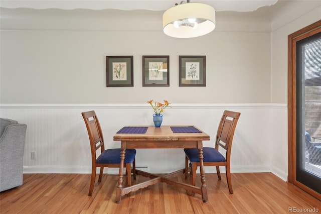4895 S Galapago St, Englewood, CO 80110 - dining area with wood finished floors and wainscoting