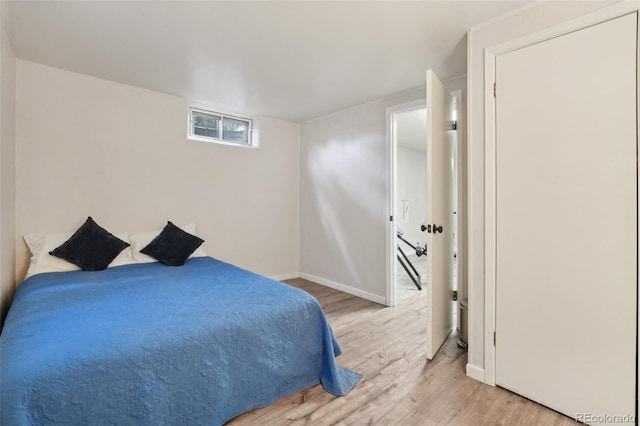 4895 S Galapago St, Englewood, CO 80110 - bedroom featuring wood finished floors and baseboards