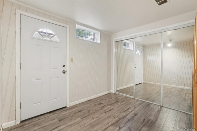 4895 S Galapago St, Englewood, CO 80110 - foyer entrance with wood finished floors and baseboards