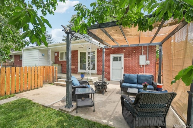 4895 S Galapago St, Englewood, CO 80110 - view of patio with an outdoor living space with a fire pit and a pergola