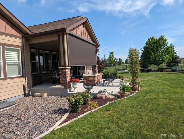 view of yard with a patio area