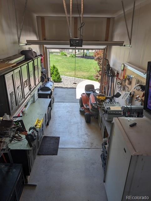 garage featuring a garage door opener