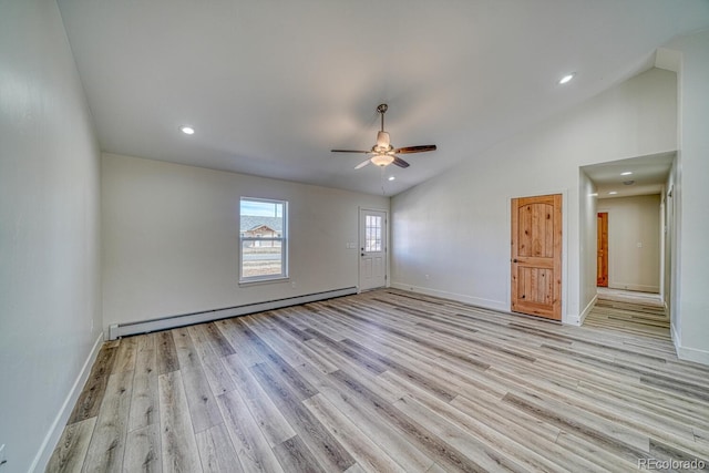 882 Hoover Cir, Poncha Springs, CO 81242 - empty room with a baseboard radiator, lofted ceiling, light wood-type flooring, ceiling fan, and baseboards