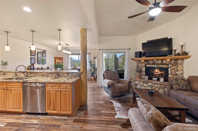 85 Lookout Ridge Dr, Dillon, CO 80435 - kitchen with stainless steel dishwasher, open floor plan, vaulted ceiling, dark wood-type flooring, and recessed lighting