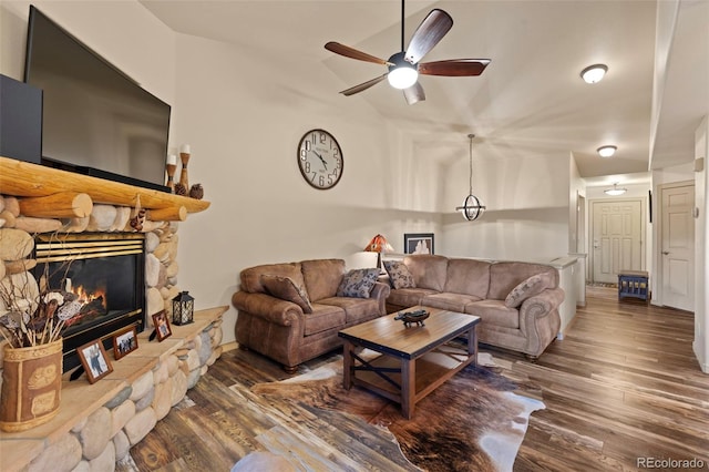 85 Lookout Ridge Dr, Dillon, CO 80435 - living room featuring a ceiling fan, wood finished floors, lofted ceiling, and a stone fireplace