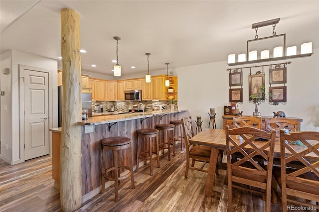 85 Lookout Ridge Dr, Dillon, CO 80435 - dining area with wood finished floors and recessed lighting