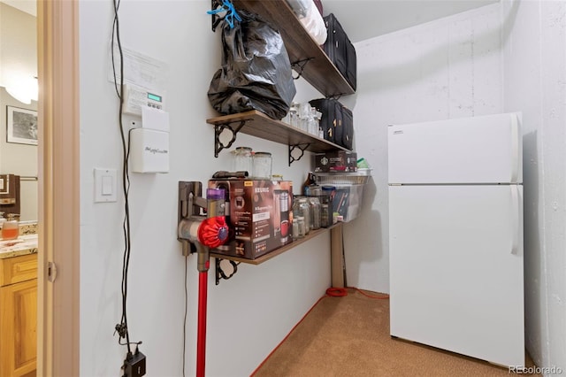 85 Lookout Ridge Dr, Dillon, CO 80435 - kitchen with freestanding refrigerator, light colored carpet, and open shelves