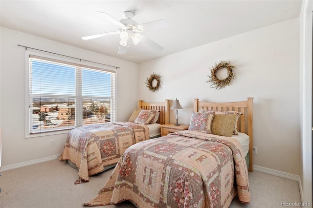 bedroom with light colored carpet and ceiling fan