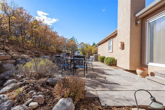 view of patio with central AC unit