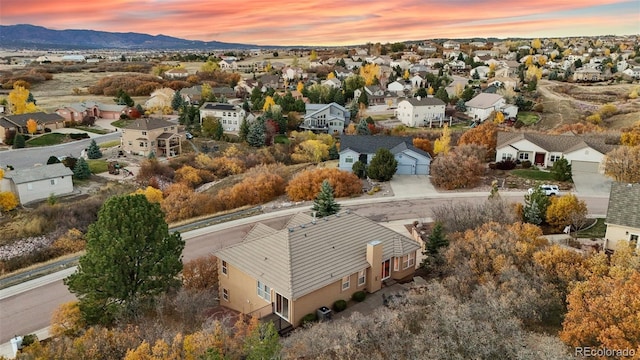 aerial view at dusk with a mountain view