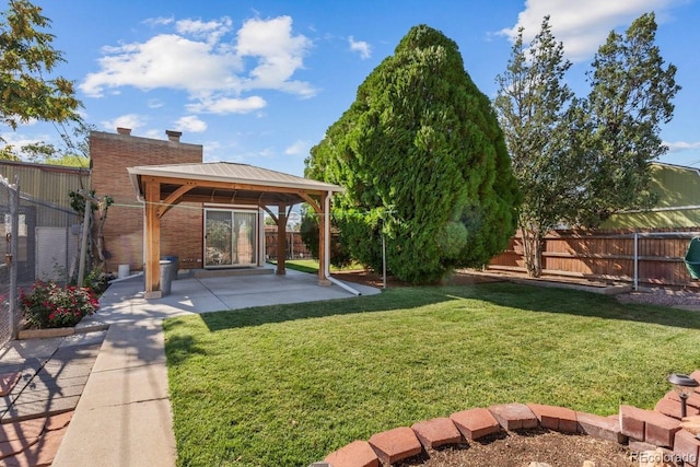 view of yard with a gazebo and a patio