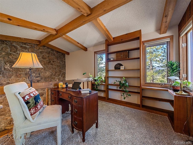 home office featuring lofted ceiling with beams, a textured ceiling, and carpet flooring