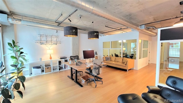 dining area with light hardwood / wood-style floors