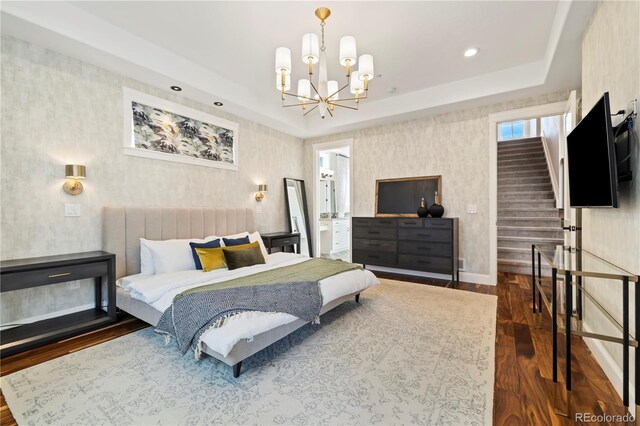 4193 W 99th Ct, Westminster, CO 80031 - bedroom with wallpapered walls, wood finished floors, a chandelier, recessed lighting, and baseboards