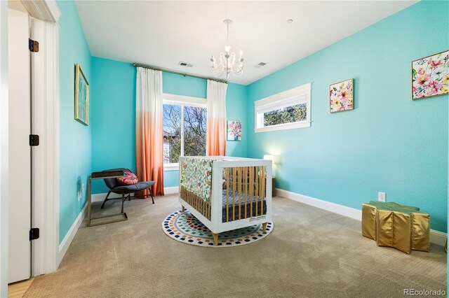 4193 W 99th Ct, Westminster, CO 80031 - carpeted bedroom with a chandelier and baseboards