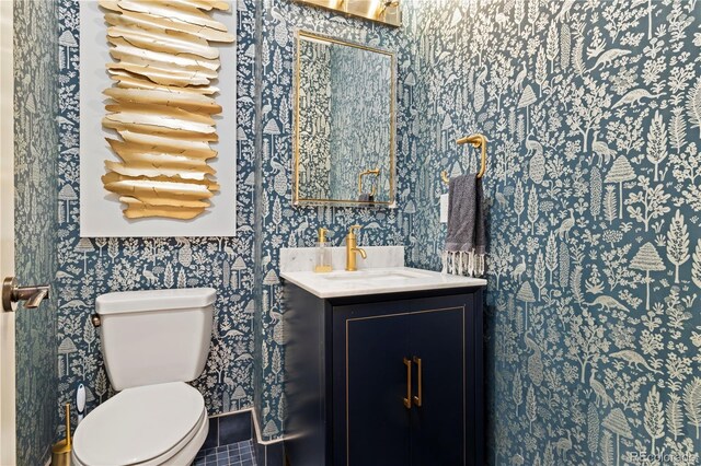 4193 W 99th Ct, Westminster, CO 80031 - half bath with wallpapered walls, toilet, and vanity