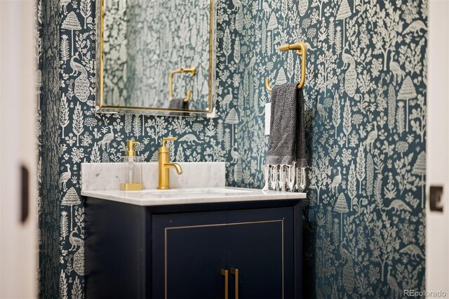 4193 W 99th Ct, Westminster, CO 80031 - bathroom with wallpapered walls and vanity