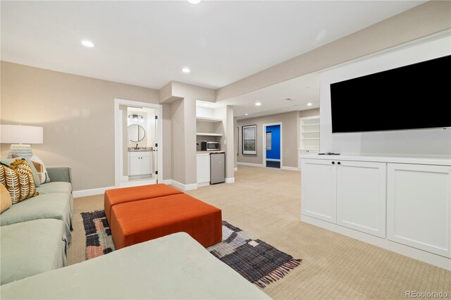 4193 W 99th Ct, Westminster, CO 80031 - living room with light colored carpet, baseboards, built in features, and recessed lighting